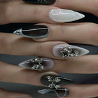 RTKHFZE Medium Press on False Nails Press on Nails Almond Black Full Cover Fake Nails with Silver Bow and Rhinestones Designs Press Ons Acrylic Nails Stick on Nails for Women 24Pcs